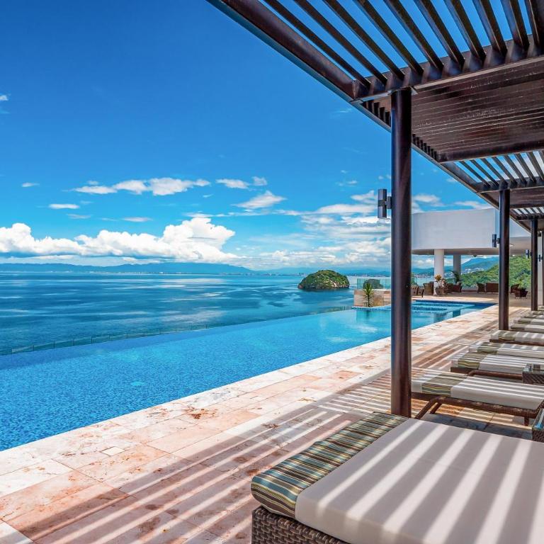 Luxurious upscale condo w/ wraparound oceanfront view & shared pool - Casa - 28