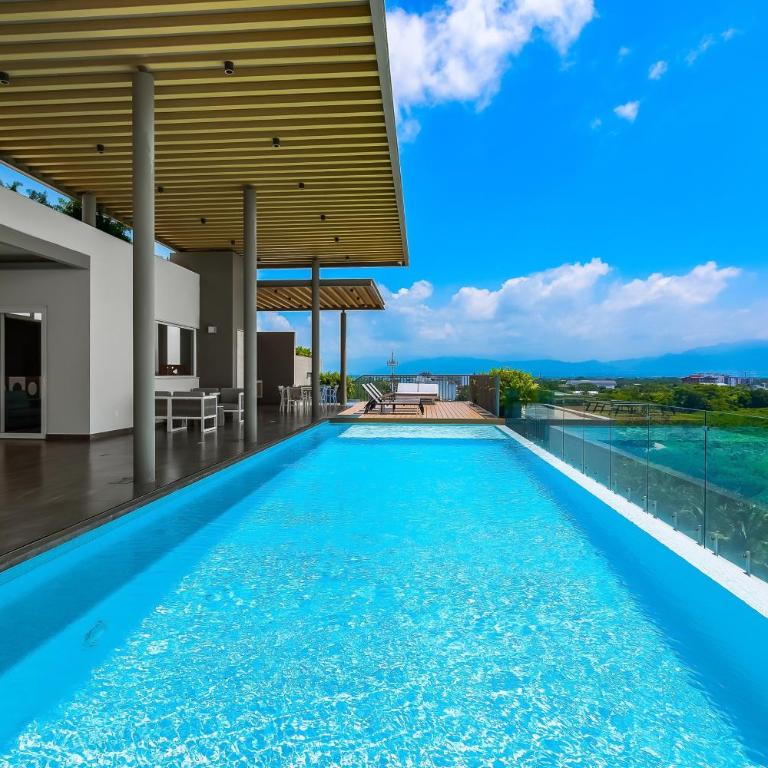 Modern condo with breathtaking views, infinity pool, and en suite bedrooms - Casa - 45