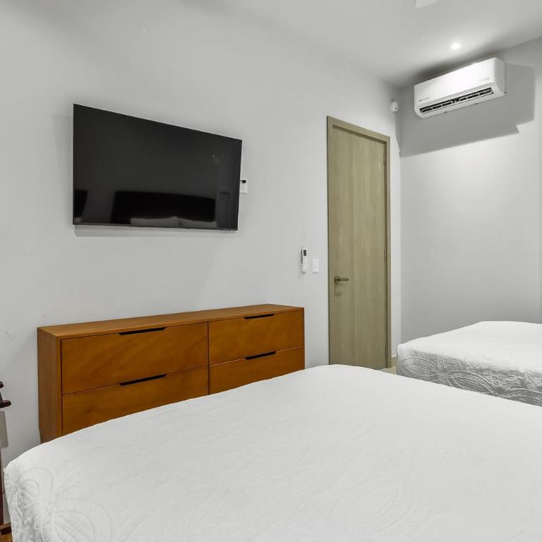 Modern condo with breathtaking views, infinity pool, and en suite bedrooms - Casa - 23