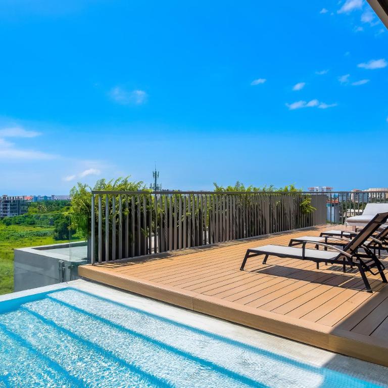 5th-floor apt near the ocean with infinity rooftop pool, balcony, washer/dryer - Casa - 30