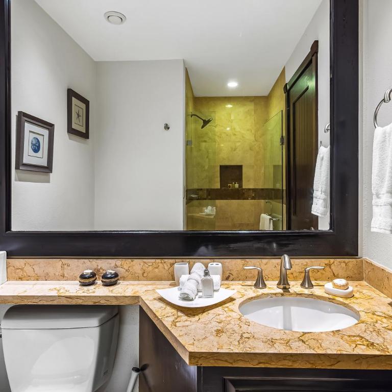 Cozy beachfront apartment with stunning ocean views and resort amenities - Vacation Home - 31