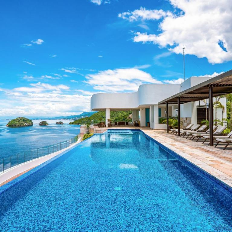 Luxurious upscale condo w/ wraparound oceanfront view & shared pool - Casa - 39
