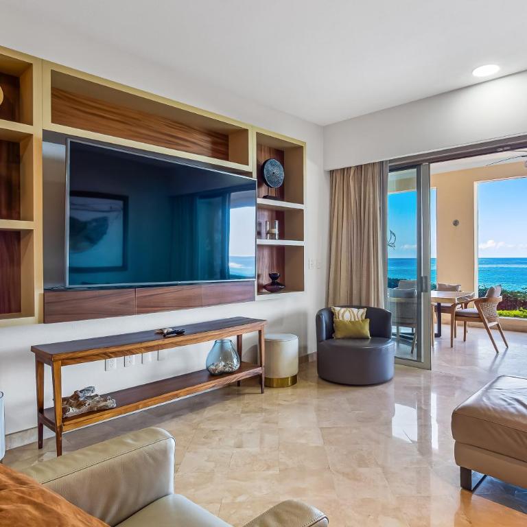 Cozy beachfront apartment with stunning ocean views and resort amenities - Vacation Home - 11