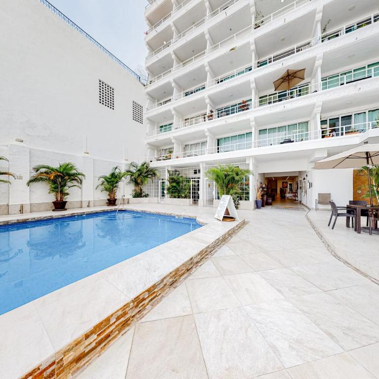Central Puerto Vallarta condo with pool, ocean views & fast WiFI - walk to beach - Vacation Home - 1