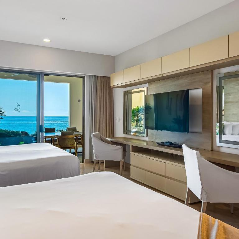 Cozy beachfront apartment with stunning ocean views and resort amenities - Vacation Home - 25