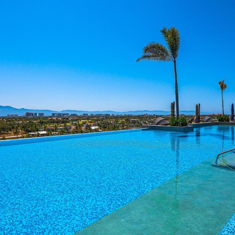 Peaceful modern condo with rooftop pool, washer-dryer and fitness room - Casa - 37