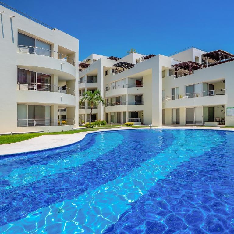 Bright coastal apartment with pool, balcony & beach access close by - Casa - 5