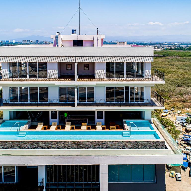 Ocean-view condo in Puerto Vallarta with rooftop pool, fitness room, and balcony - Vacation Home - 1
