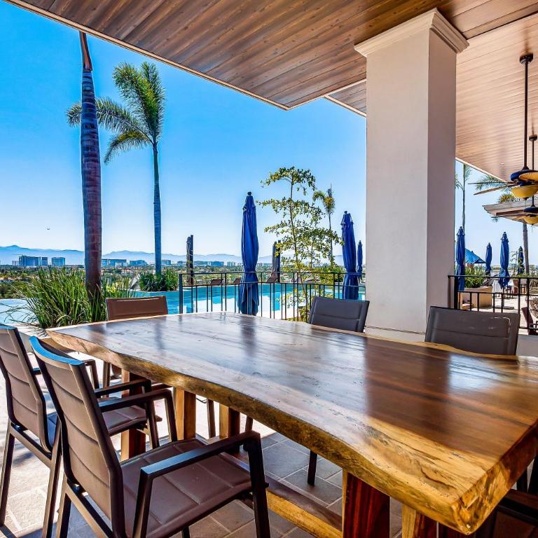 Mountain-view apartment near beach with balcony, rooftop pool, gym, & Ping-Pong - Casa - 43