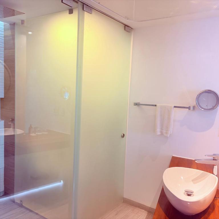 Luxury Beachfront Escape at The Carmen Hotel - King Suite with Ocean View - 26