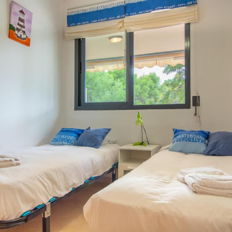Global Vacacional, Amplia planta baja con dos habitaciones en Canet - Appartement avec Terrasse - 12