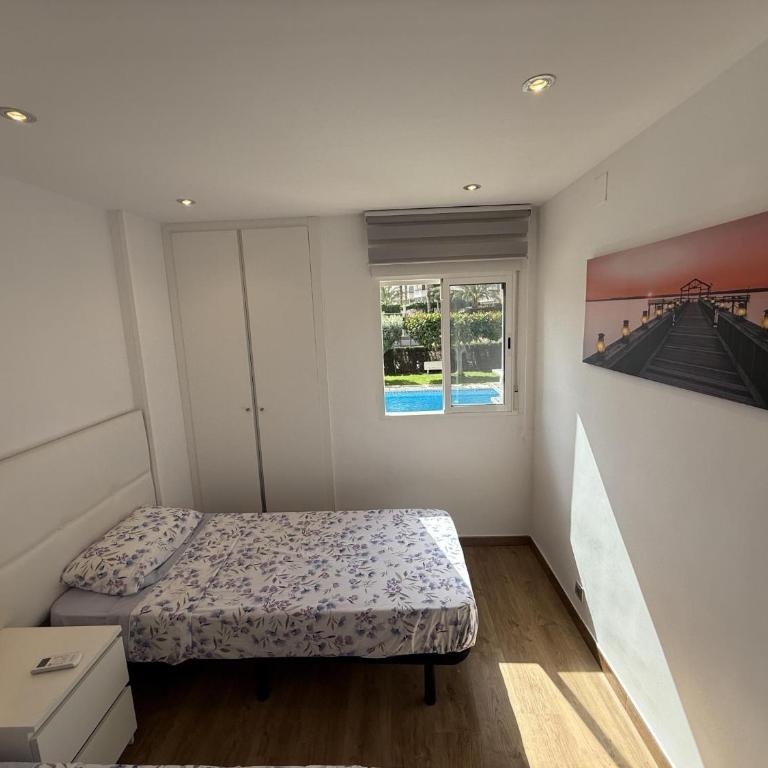 Apartamento en primera línea en Muchavista con terraza, piscina y vistas al mar by Turihome - Apartment - 9