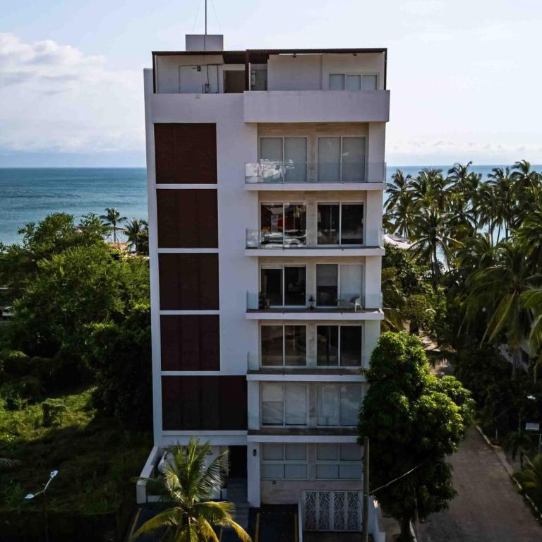 Relaxing condo with rooftop pool, oceanview balcony & walkable beach access - Casa - 4