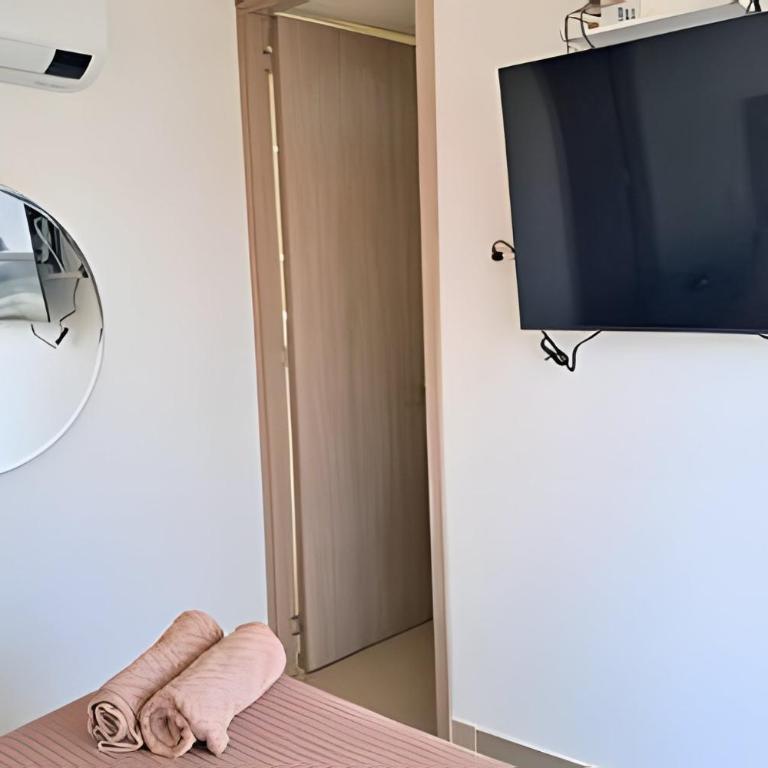 Beautiful duplex with 2 bedrooms, air conditioning, and rooftop in Bocagrande - Apartment - 7