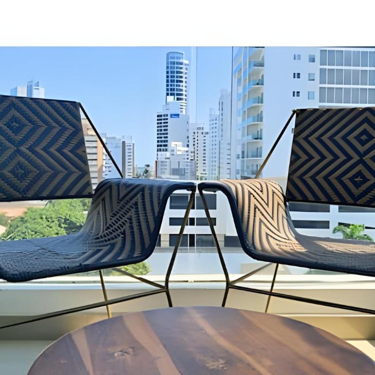 Beautiful duplex with 2 bedrooms, air conditioning, and rooftop in Bocagrande - Apartment - 32