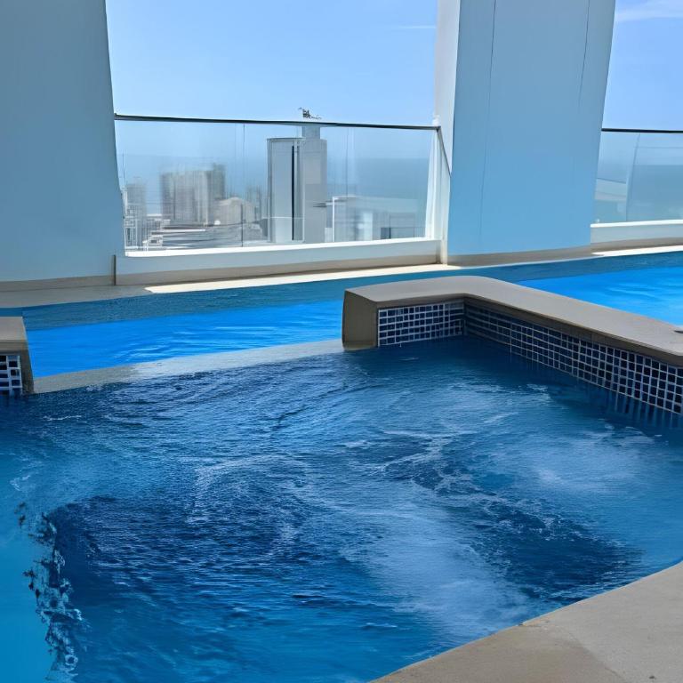 Beautiful duplex with 2 bedrooms, air conditioning, and rooftop in Bocagrande - Apartment - 34