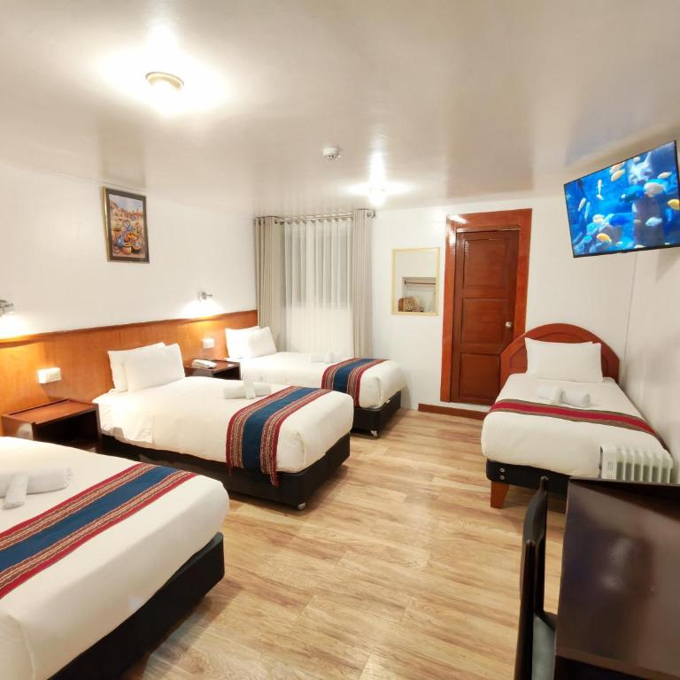 Saphi Inn Cusco - Excelente ubicación - Standard Quadruple Room - 9