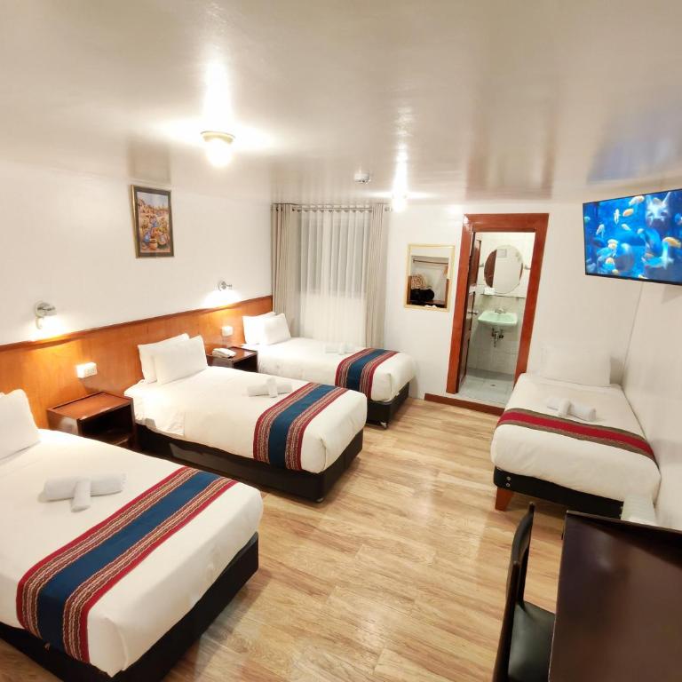 Saphi Inn Cusco - Excelente ubicación - Standard Quadruple Room - 5
