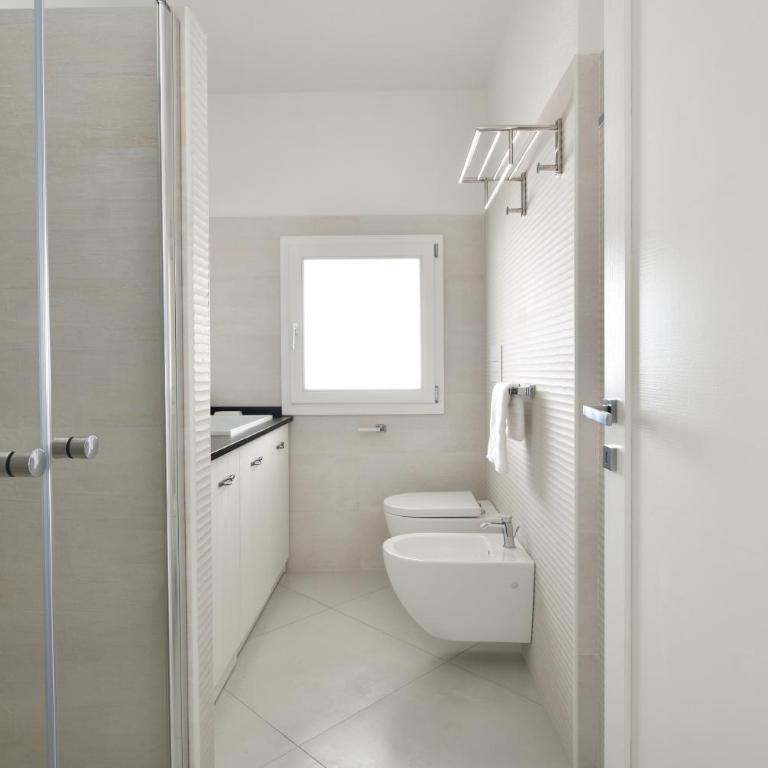 Appartamento prato al mare - Appartamento Deluxe con 2 Camere da Letto e Vista Giardino - 18