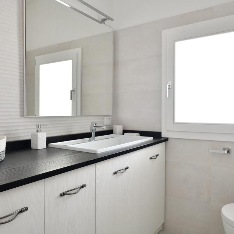 Appartamento prato al mare - Appartamento Deluxe con 2 Camere da Letto e Vista Giardino - 17