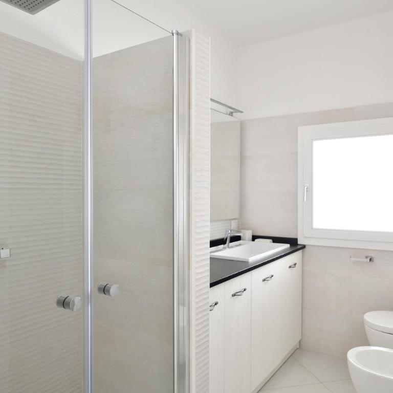 Appartamento prato al mare - Appartamento Deluxe con 2 Camere da Letto e Vista Giardino - 16