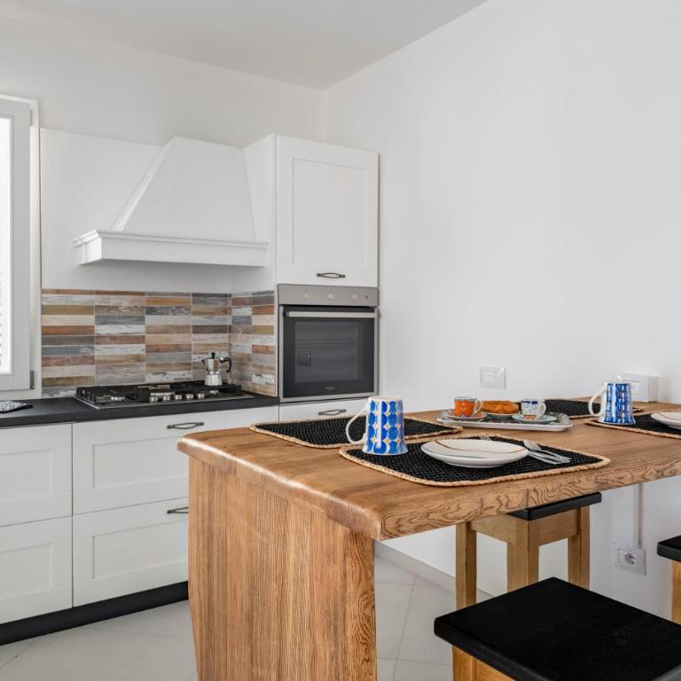 Appartamento prato al mare - Appartamento Deluxe con 2 Camere da Letto e Vista Giardino - 4