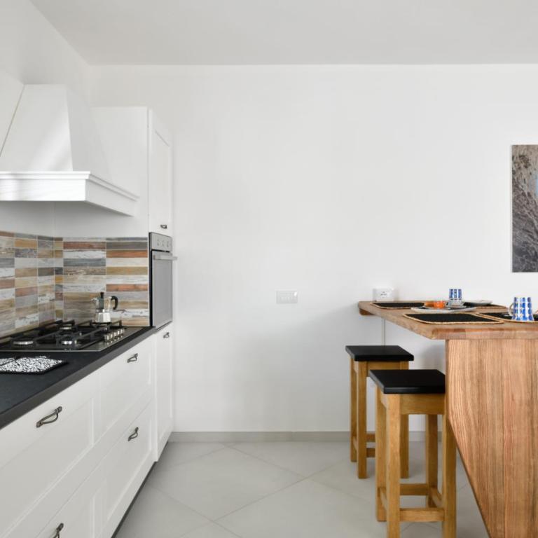 Appartamento prato al mare - Appartamento Deluxe con 2 Camere da Letto e Vista Giardino - 10
