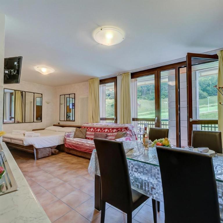 La Marmotta Ski in/ski out - Studio with Terrace - Happy Rentals - Estudio con terraza - 1