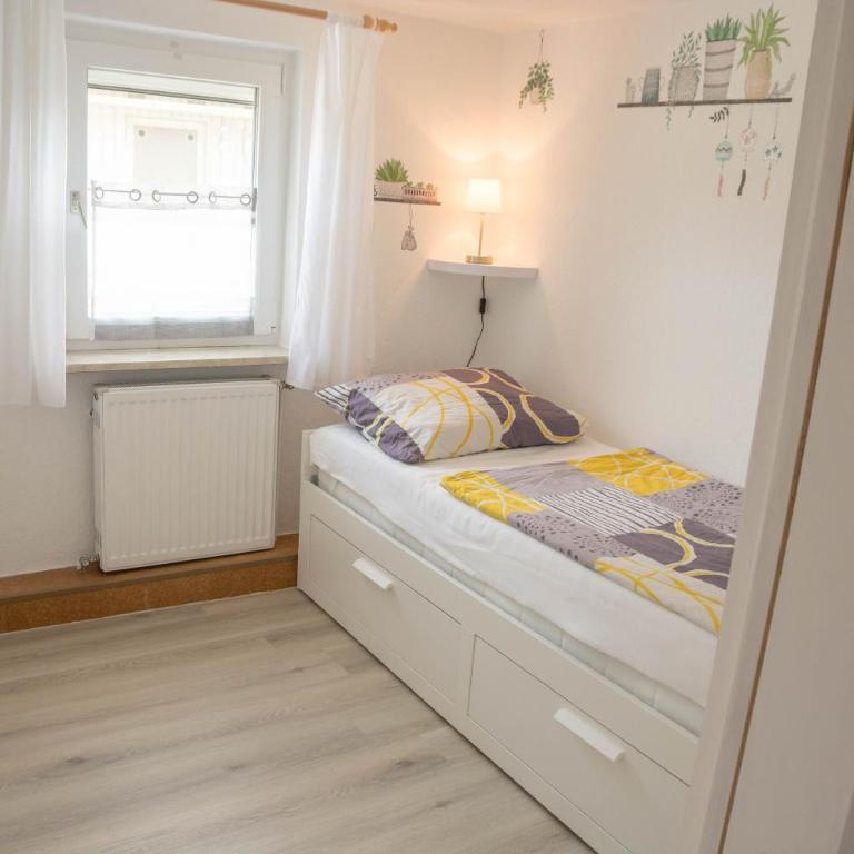 Ferienwohnung Kleiner Spatz - Deluxe-Apartment mit 2 Schlafzimmern und Gartenblick - 11