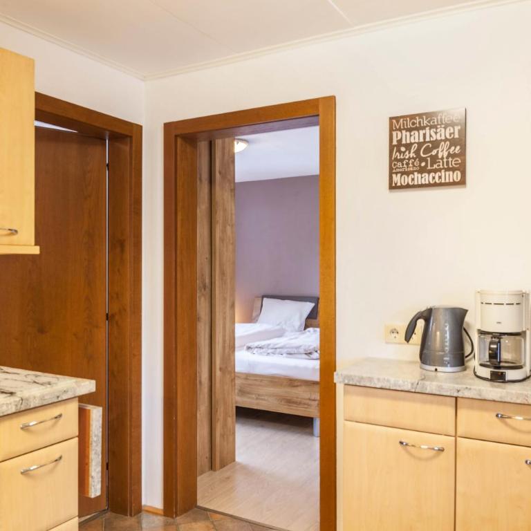 Haus Excelsior Top 21 - Deluxe-Apartment mit 2 Schlafzimmern und Gartenblick - 15