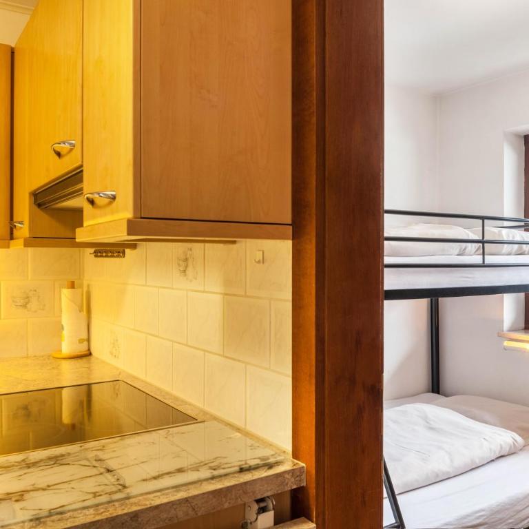 Haus Excelsior Top 21 - Deluxe-Apartment mit 2 Schlafzimmern und Gartenblick - 16