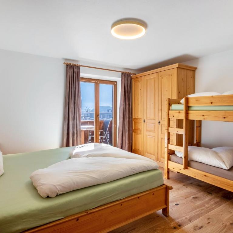 Pixnerhof - Ferienwohnung Golden - Apartamento Deluxe de 2 dormitorios con vistas al jardín - 18