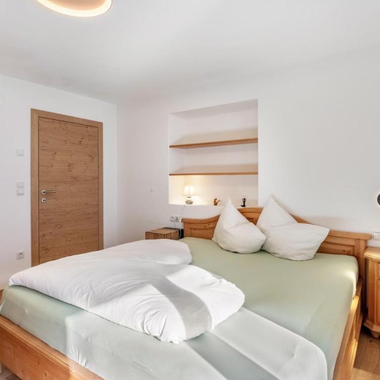 Pixnerhof - Ferienwohnung Golden - Apartamento Deluxe de 2 dormitorios con vistas al jardín - 16