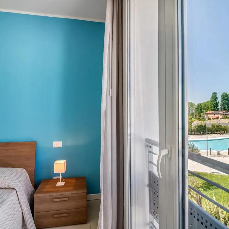 Residence Blu Village - Appartamento Deluxe con 2 Camere da Letto e Vista Giardino - 15
