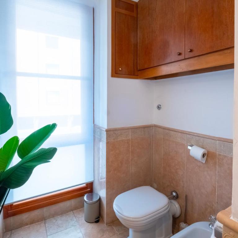Giardino su Porta Portese - Appartamento con 2 Camere da Letto e Balcone - 18