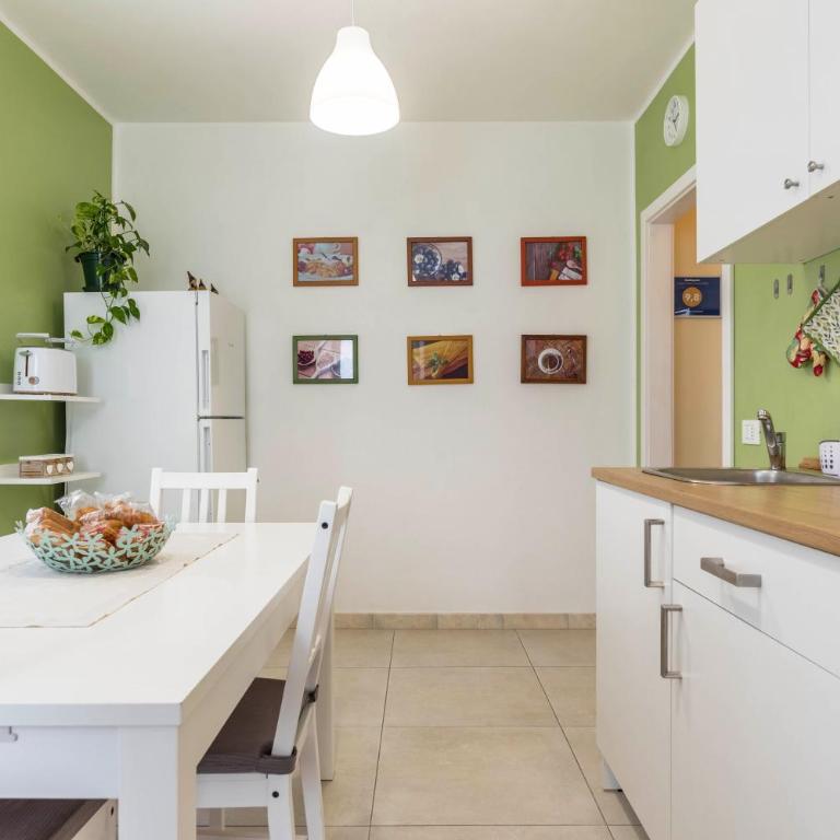 Appartamento Le Quattro Stagioni - Two-Bedroom Deluxe Apartment with Garden View - 8