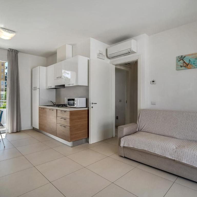 Residence Blu Village - Appartamento Deluxe con 2 Camere da Letto e Vista Giardino - 8