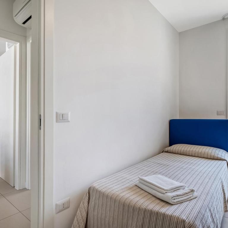 Residence Blu Village - Appartamento Deluxe con 2 Camere da Letto e Vista Giardino - 17