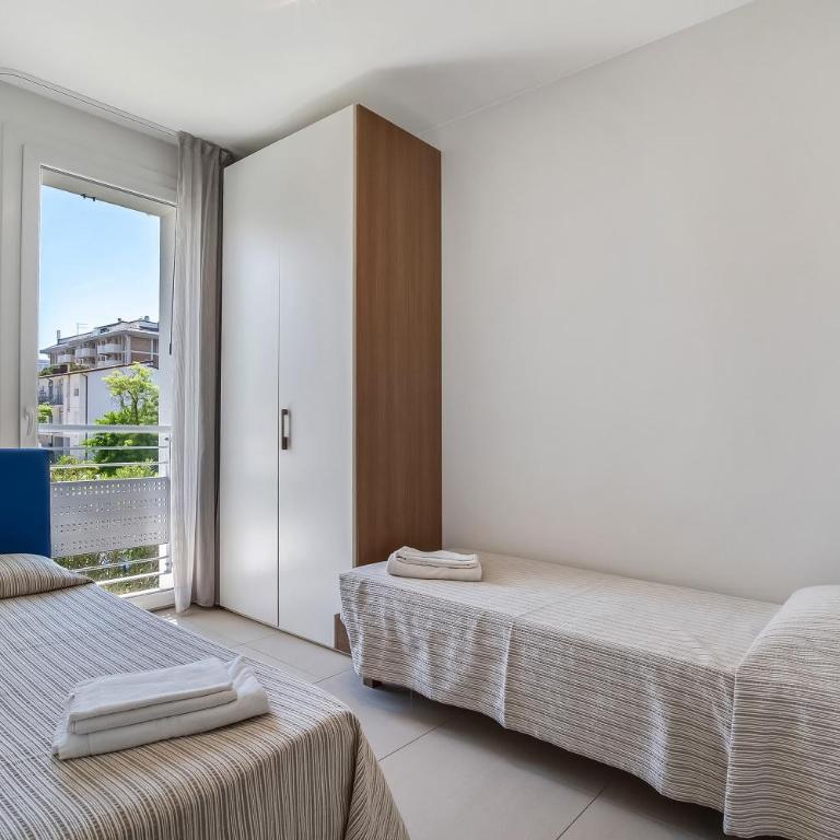 Residence Blu Village - Appartamento Deluxe con 2 Camere da Letto e Vista Giardino - 16
