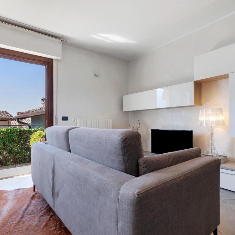Appartamento Il Campanile - Appartamento Deluxe con 2 Camere da Letto e Vista Giardino - 8
