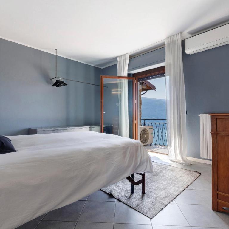 Appartamento Il Campanile - Appartamento Deluxe con 2 Camere da Letto e Vista Giardino - 9