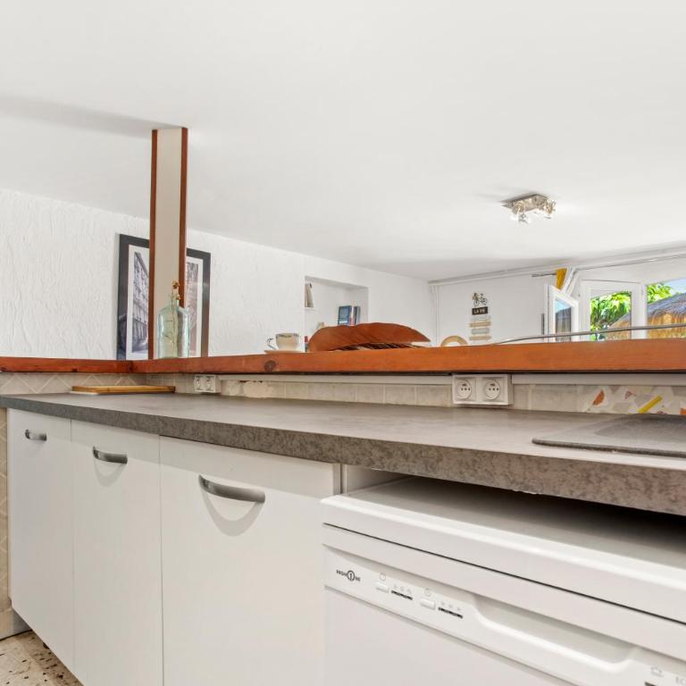 Appartement La Marina - Two-Bedroom Deluxe Apartment with Garden View - 6