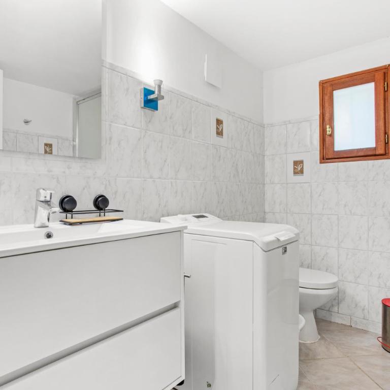 Appartement La Marina - Two-Bedroom Deluxe Apartment with Garden View - 15