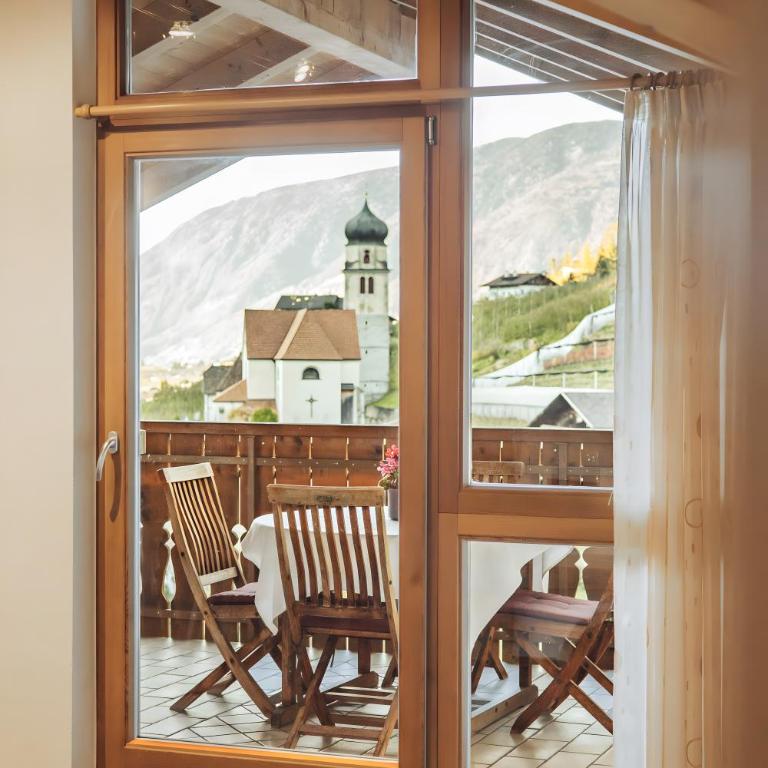 Oberegghof Ferienwohnung Hahnenkamm - Two-Bedroom Deluxe Apartment with Garden View - 1
