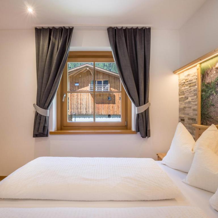 Lechnerhof Murmeltier - Deluxe-Apartment mit 2 Schlafzimmern und Gartenblick - 10