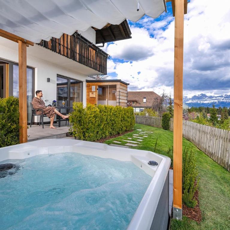 Chalet Schlossberg Rosengarten - Appartamento Deluxe con 2 Camere da Letto e Vista Giardino - 18