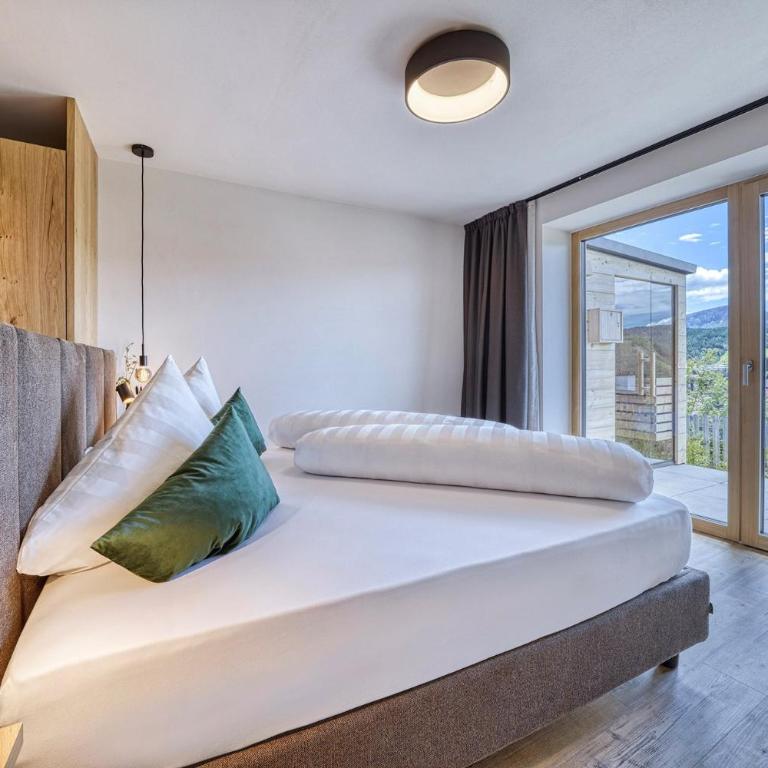 Chalet Schlossberg Rosengarten - Appartamento Deluxe con 2 Camere da Letto e Vista Giardino - 12