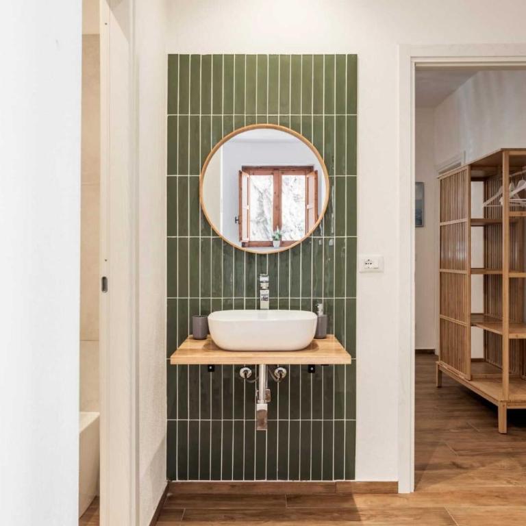 Travel Rooms - Arenella Holidays - One-Bedroom Apartment with Garden View - 9