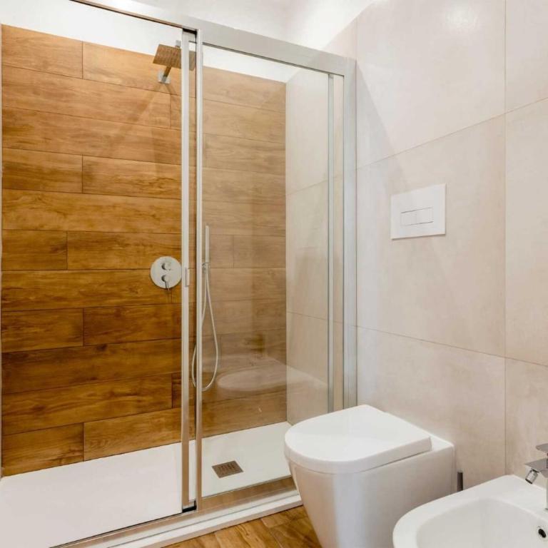 Travel Rooms - Arenella Holidays - One-Bedroom Apartment with Garden View - 10