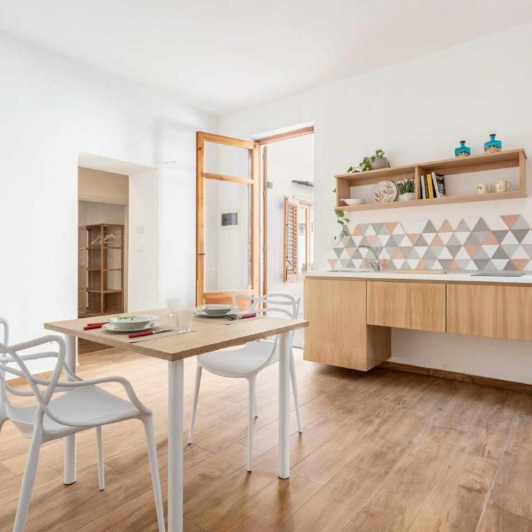 Travel Rooms - Arenella Holidays - One-Bedroom Apartment with Garden View - 2